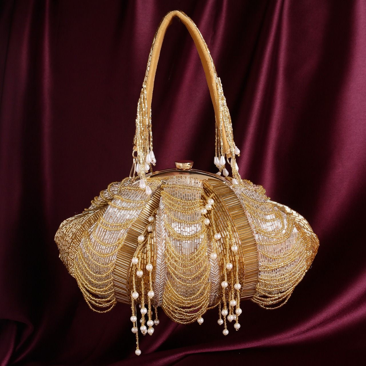 Golden celebrity inspired batua clutch bag