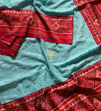 Aqua chikankari patola bordered sari