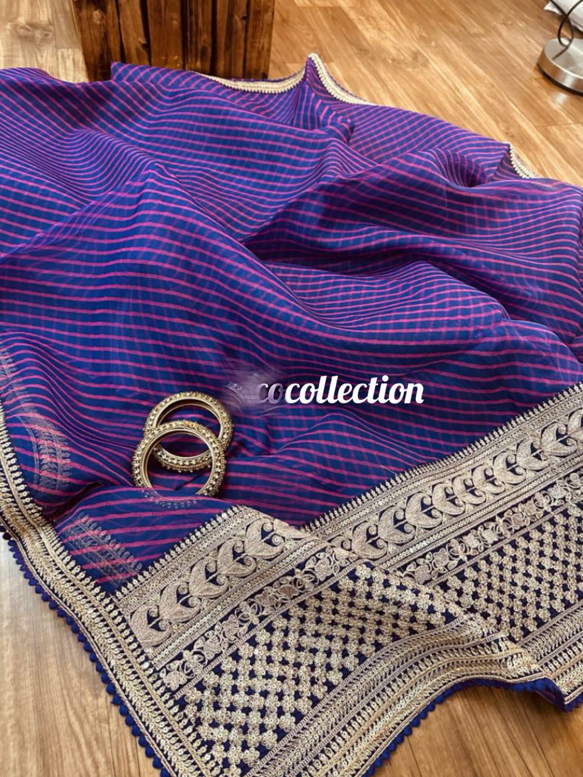 Striped purple organza weaved saree