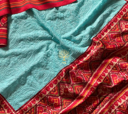 Aqua chikankari patola bordered sari