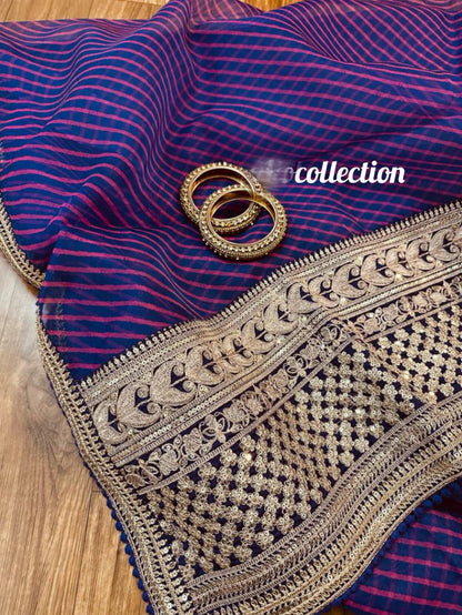Striped purple organza weaved saree