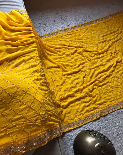 Yellow chiffon crepe feather sarees