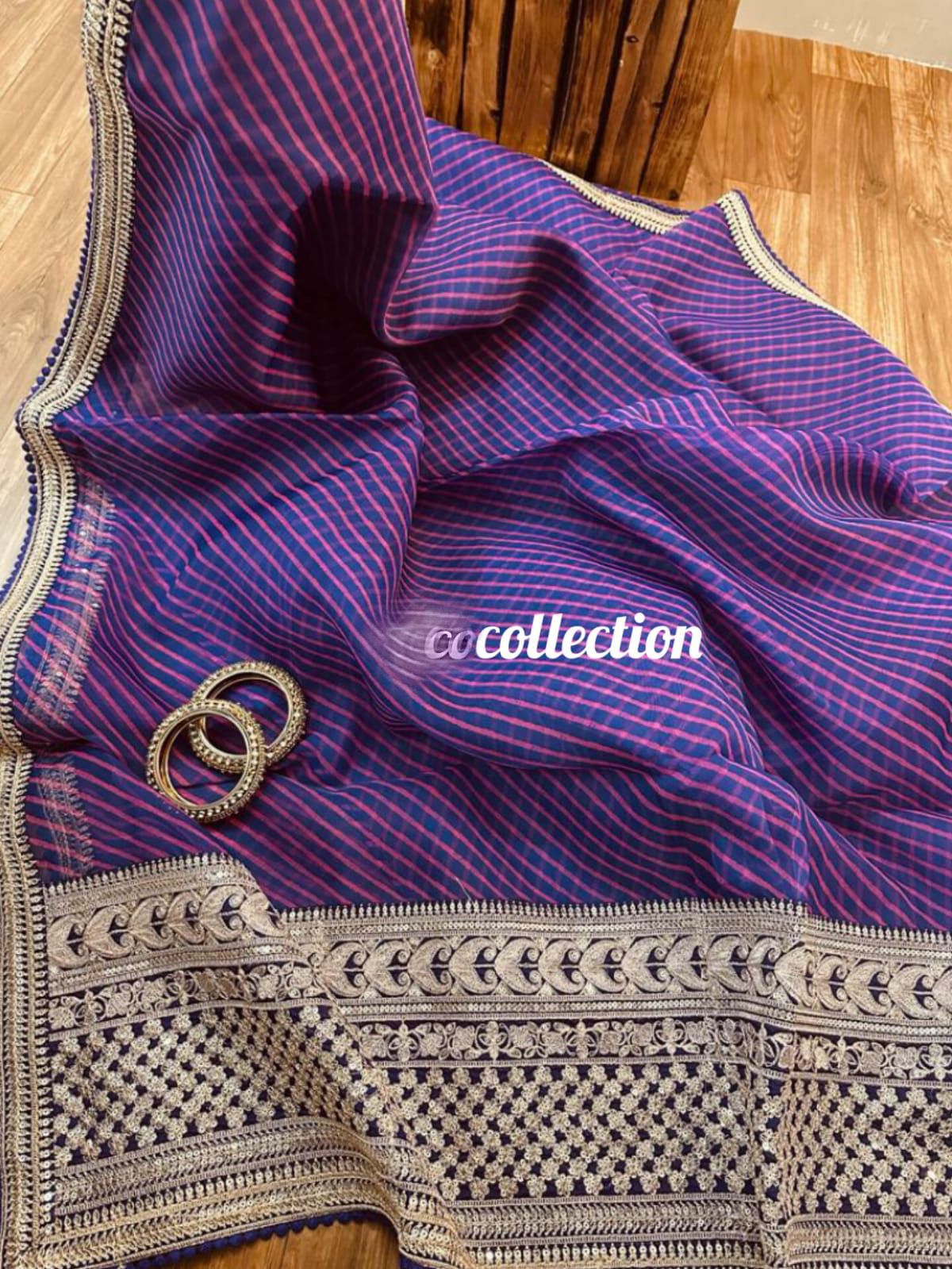 Striped purple organza weaved saree