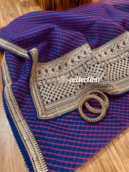 Striped purple organza weaved saree