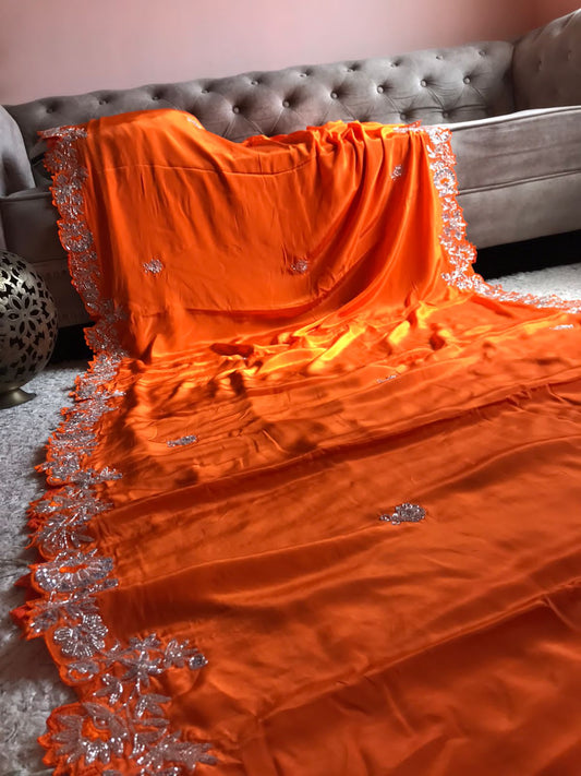 Preety orange organza silky saris
