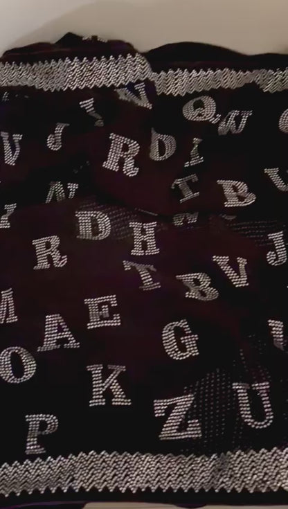 Alphabetic inspired black Swarovski saree