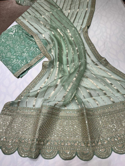 Arvenia striped organza saree