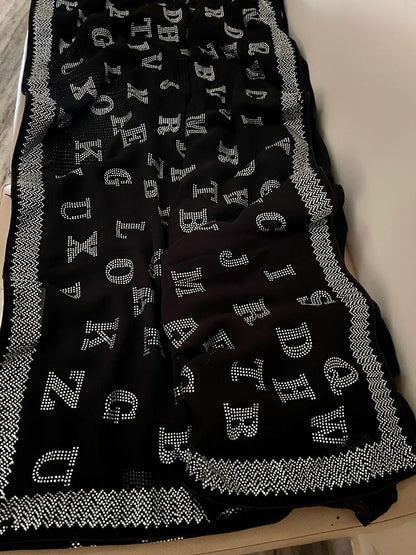 Alphabetic inspired black Swarovski saree