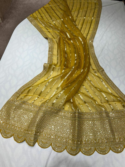 Arvenia striped organza saree